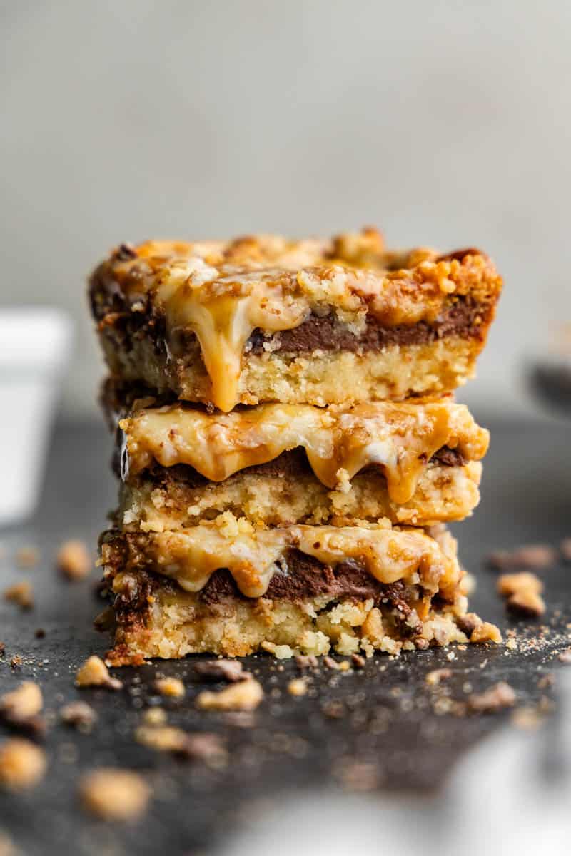 side view of a stack of toffee dessert bars on table