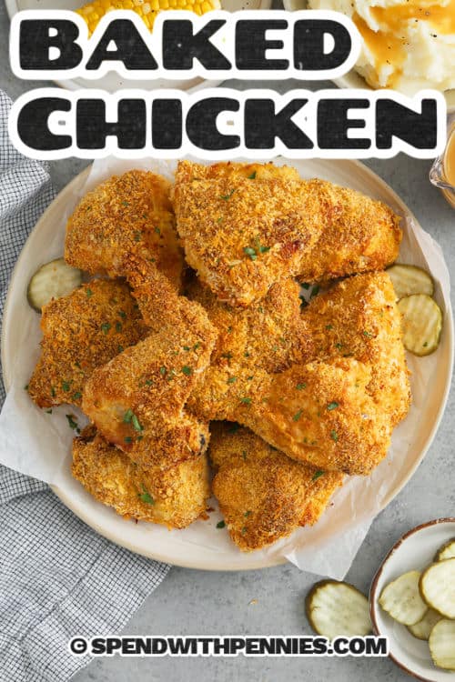 Oven fried chicken is crispy, golden, and packed with flavor thanks to a coating of Panko, cornflakes, and cornmeal. Seasoned with garlic, paprika, and pepper, each bite delivers juicy chicken inside a perfectly crunchy crust. It’s oven-baked to crispy perfection without deep frying. Perfect for a weeknight dinner or weekend treat! #spendwithpennies Oven Fried Chicken with pickles and a title