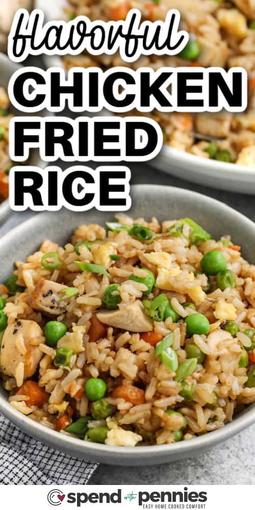Chicken fried rice is a delicious way to use up leftover rice and make a meal everyone loves. With scrambled eggs, veggies, chicken, and green onions, every bite is full of flavor. A little sesame oil gives it that extra something special. It’s a great go-to dish for busy families. #spendwithpennies closeup of chicken fried rice in a bowl with writing