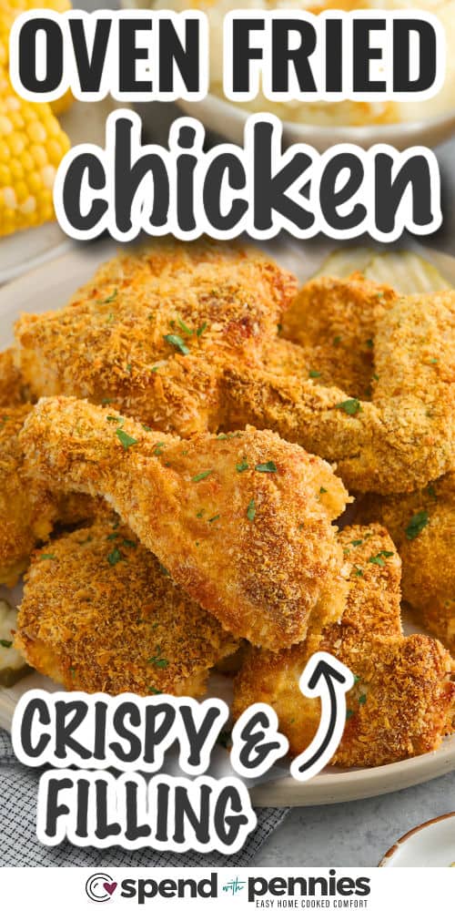 Oven fried chicken comes out juicy on the inside with a crispy, seasoned coating on the outside. Made with a blend of cornflakes, Panko, and cornmeal, the crust delivers serious crunch without a greasy mess. It’s easy to prep and bakes to perfection in under an hour. Serve with mashed potatoes or coleslaw for a hearty meal. #spendwithpennies crispy and filling Oven Fried Chicken with writing