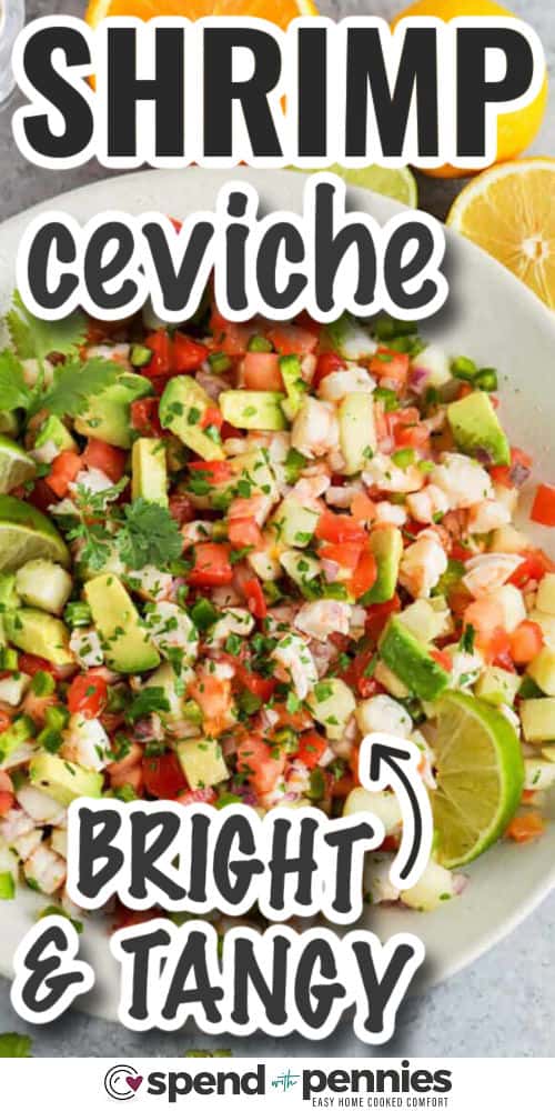 It is so easy to have the flavors of Mexico at home with this shrimp ceviche recipe. Have this easy no-cook salad ready in no time. It will be hard to beat such a flavorful salad that is so healthy and low in calories. Jicama, onions, tomatoes, cilantro, and some avocado are combined making this a crunchy and colorful salad that is just bursting with flavor. #spendwithpennies bright and tangy Shrimp Ceviche with writing