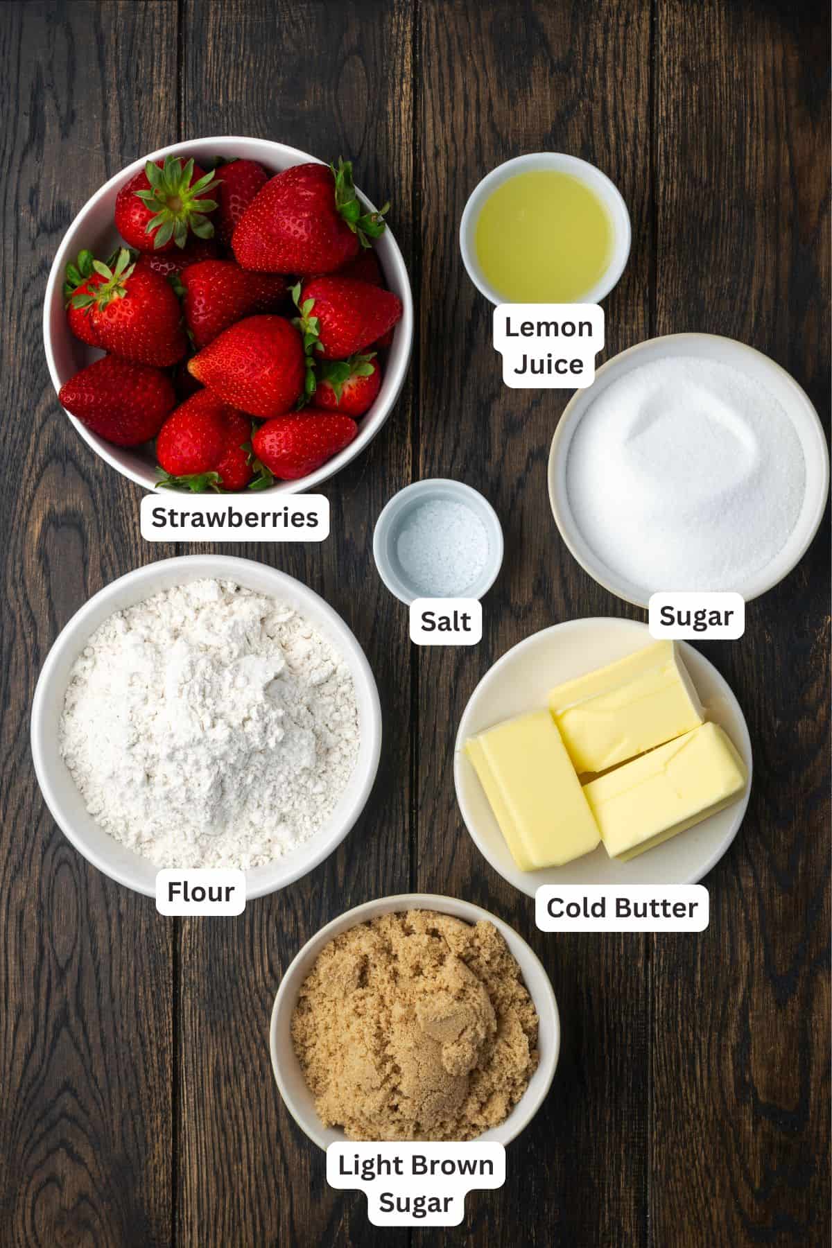 Strawberry cobbler ingredients with text labels overlaying each ingredient.