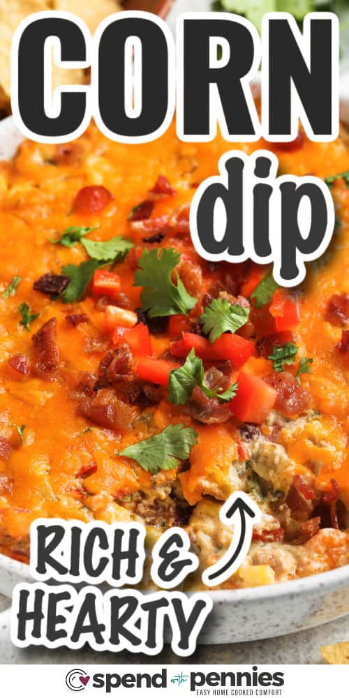 This corn dip recipe is full of creamy, cheesy flavor and just the right amount of spice. It’s loaded with corn, cream cheese, bacon, chiles, chili powder, and shredded cheddar, then baked until hot and melty. Inspired by street corn from Mexico, it’s perfect for serving with tortilla chips. Add beef for a heartier version or keep it simple for a tasty cold dip that works year-round. #spendwithpennies rich and hearty Creamy Baked Corn Dip with writing